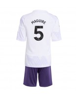 Otroške Nogometnih dresov Manchester United Harry Maguire #5 Gostujoči 2025-26 Kratki rokavi (+ hlače)